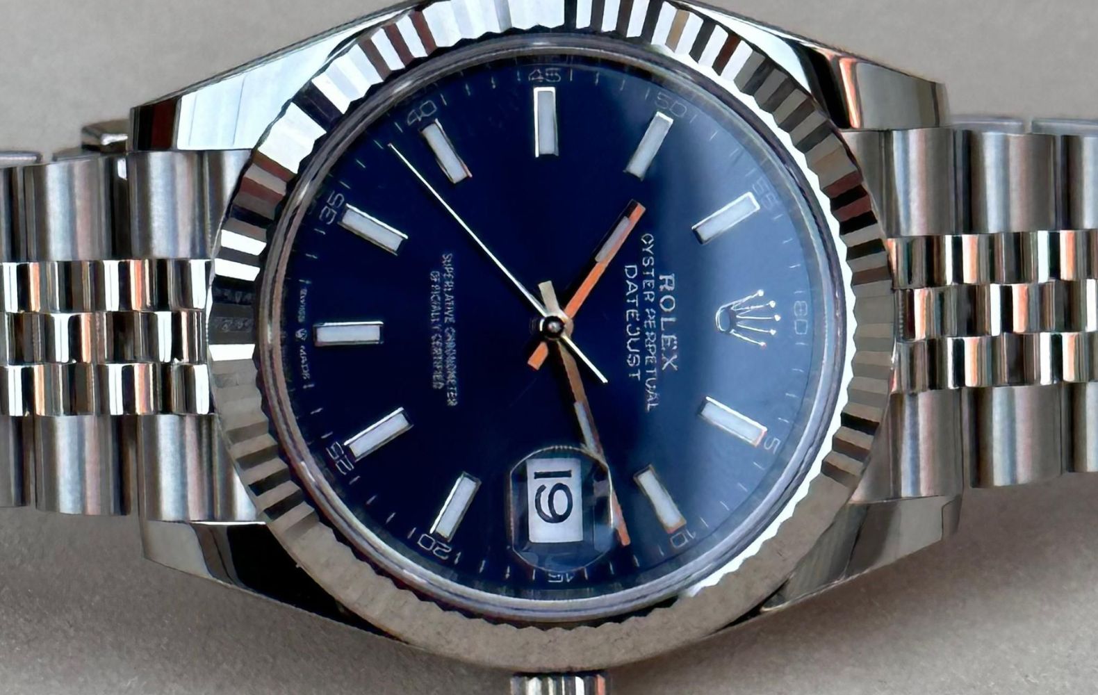 How much is a blue face rolex hotsell