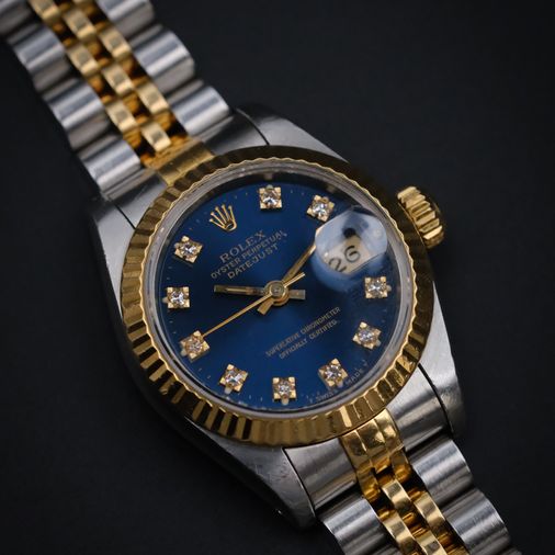 Rolex met een Blauwe wijzerplaat