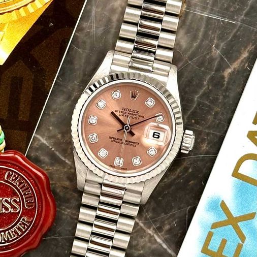 Rolex with pink face hot sale