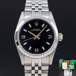 Rolex Oyster Perpetual 31 67480 (1996) - Black dial 31 mm Steel case (1/8)