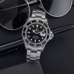 Rolex Submariner Date 16610T (2009) - Zwart wijzerplaat 40mm Staal (1/8)