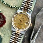 Rolex Datejust 31 68273 (1988) - Gold dial 31 mm Gold/Steel case (1/8)