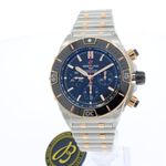 Breitling Chronomat UB0136251B1U1 (2024) - Zwart wijzerplaat 44mm Goud/Staal (1/3)