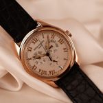 Patek Philippe Annual Calendar 5035R (1997) - Wit wijzerplaat 37mm Roodgoud (1/8)