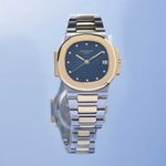 Patek Philippe Nautilus 3800/1 (1985) - Blauw wijzerplaat 39mm Goud/Staal (1/6)
