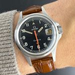 Omega Genève 166.038 (1969) - Black dial 35 mm Steel case (2/8)