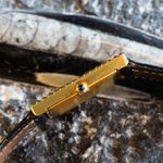 Corum Vintage 57342 (1970) - Black dial 24 mm Yellow Gold case (4/5)