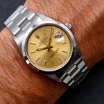 Rolex Oyster Perpetual Date 15200 (1990) - Gold dial 34 mm Steel case (1/5)