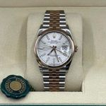 Rolex Datejust 126201 (2026) - Silver dial 44 mm Gold/Steel case (1/10)