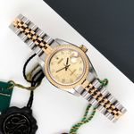 Rolex Lady-Datejust 69173 (1994) - Champagne wijzerplaat 26mm Goud/Staal (1/7)