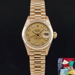 Rolex Lady-Datejust 69178 (1984) - Champagne wijzerplaat 26mm Geelgoud (1/8)