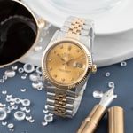 Rolex Datejust 36 16013 (1987) - Champagne wijzerplaat 36mm Goud/Staal (1/8)