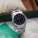 Rolex Explorer 114270 (2002) - Zwart wijzerplaat 36mm Staal (1/8)