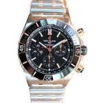 Breitling Chronomat UB0136251B1U1 (2024) - Black dial 44 mm Gold/Steel case (2/2)