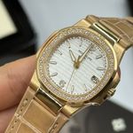 Patek Philippe Nautilus 7010R-011 (2020) - Zilver wijzerplaat 32mm Roségoud (8/8)