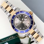 Rolex Submariner Date 16613LB (1999) - Blauw wijzerplaat 40mm Goud/Staal (1/8)