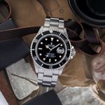 Rolex Submariner Date 168000 (1988) - Zwart wijzerplaat 40mm Staal (1/8)