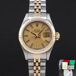 Rolex Lady-Datejust 69173 (1985) - Champagne wijzerplaat 26mm Goud/Staal (1/8)