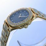 Patek Philippe Nautilus 4700 (1990) - Black dial 27 mm Yellow Gold case (8/10)