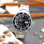 Rolex Submariner Date 16610 (Onbekend (willekeurig serienummer)) - Zwart wijzerplaat 40mm Staal (1/8)