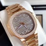 Patek Philippe Nautilus 7118/1200R-010 (2023) - Gold dial 35 mm Rose Gold case (1/4)