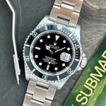 Rolex Submariner Date 16610 (1991) - Zwart wijzerplaat 40mm Staal (1/8)