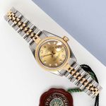 Rolex Lady-Datejust 69173 (1994) - Champagne wijzerplaat 26mm Goud/Staal (1/8)