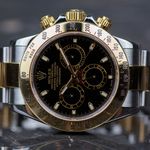 Rolex Daytona 116523 (2007) - Zwart wijzerplaat 40mm Goud/Staal (1/8)