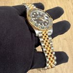 Rolex GMT-Master II 126713grnr (2026) - Black dial 40 mm Gold/Steel case (10/10)