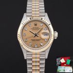 Rolex Lady-Datejust 69179 (1988) - Champagne wijzerplaat 26mm Witgoud (1/8)