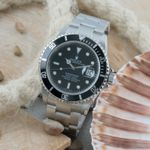 Rolex Submariner Date 16610T (2005) - Zwart wijzerplaat 40mm Staal (1/8)