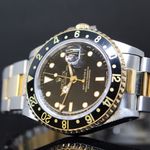 Rolex GMT-Master II 16713 (1994) - Black dial 40 mm Gold/Steel case (3/7)