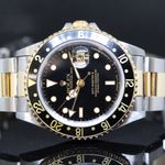 Rolex GMT-Master II 16713 (1994) - Black dial 40 mm Gold/Steel case (1/7)