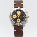 Breitling Chronomat B13047 (1990) - Black dial 39 mm Gold/Steel case (1/8)