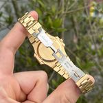 Patek Philippe Nautilus 3800 (1994) - Yellow dial 38 mm Yellow Gold case (2/3)