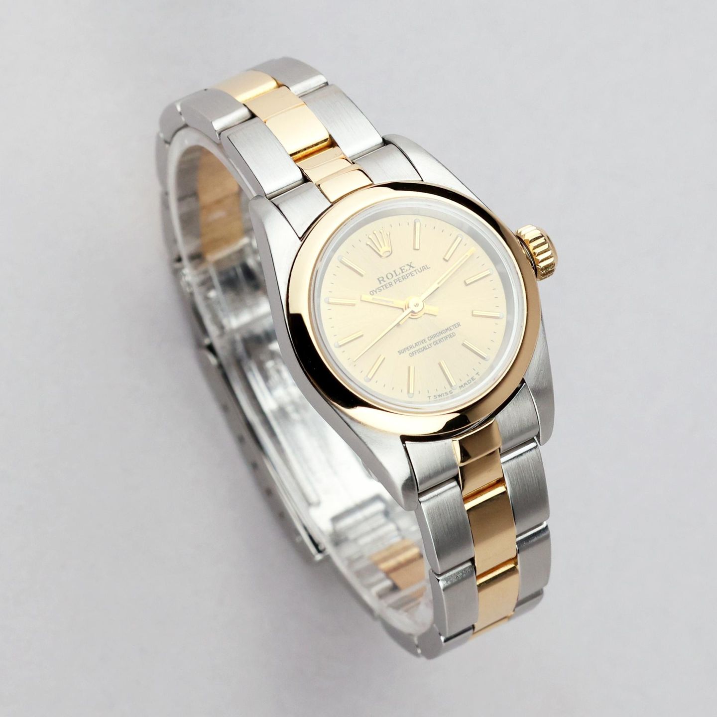 Rolex Oyster Perpetual 67193 (Onbekend (willekeurig serienummer)) - Champagne wijzerplaat 26mm Goud/Staal (2/7)