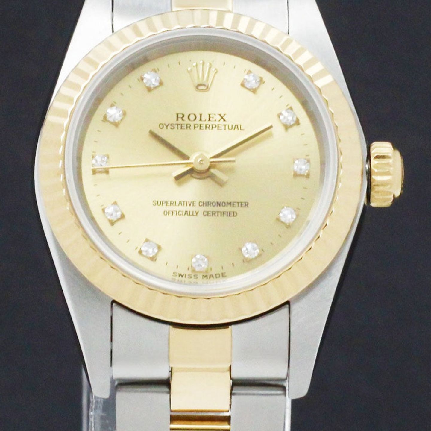 Rolex Oyster Perpetual 76193 (1999) - Gold dial 26 mm Gold/Steel case (1/7)