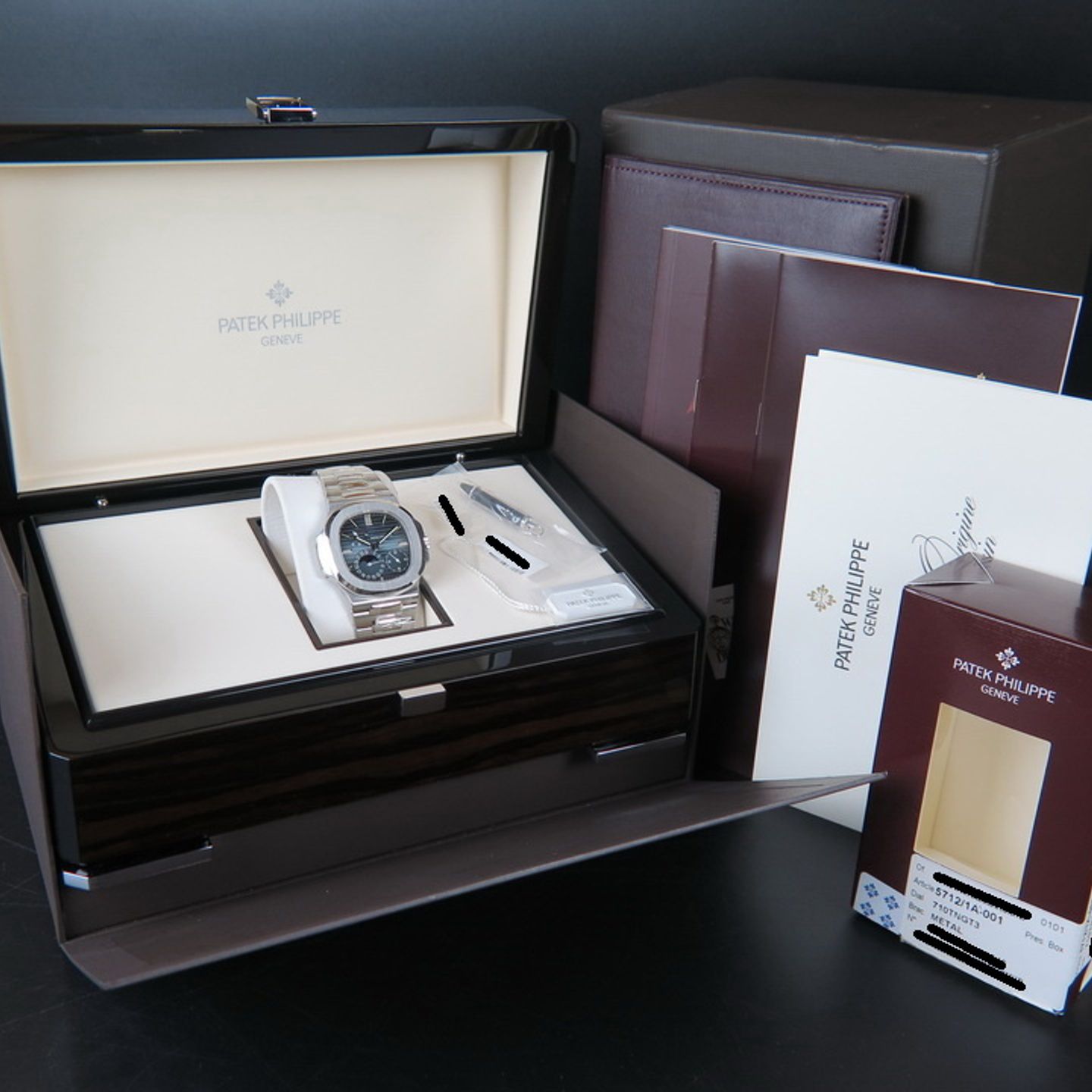 Patek Philippe Nautilus 5712/1A (2007) - Blauw wijzerplaat 40mm Staal (4/4)