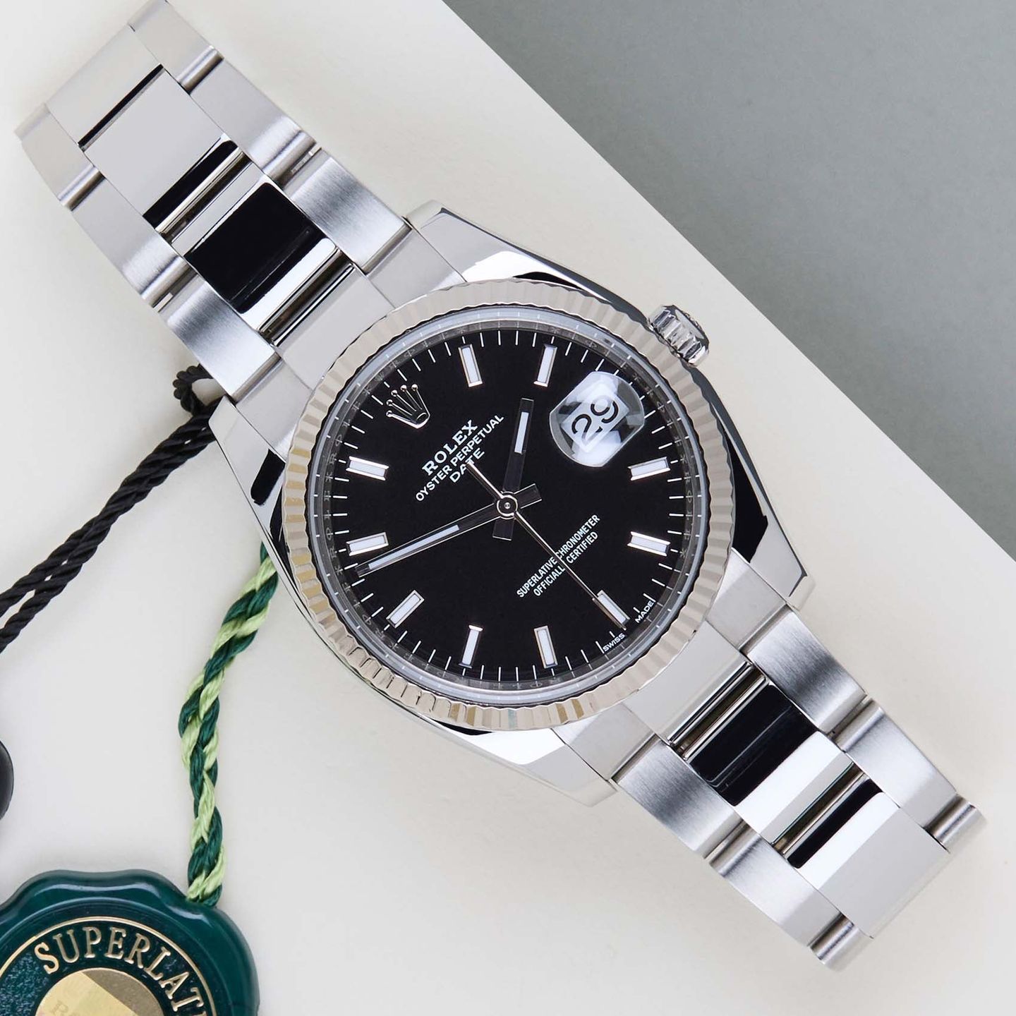 Rolex Oyster Perpetual Date 115234 (2021) - 34mm Staal (1/8)