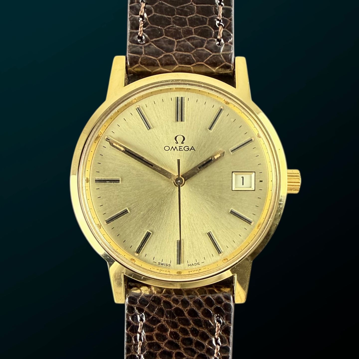 Omega Genève 136.0104 (1977) - Gold dial 35 mm Gold/Steel case (1/8)