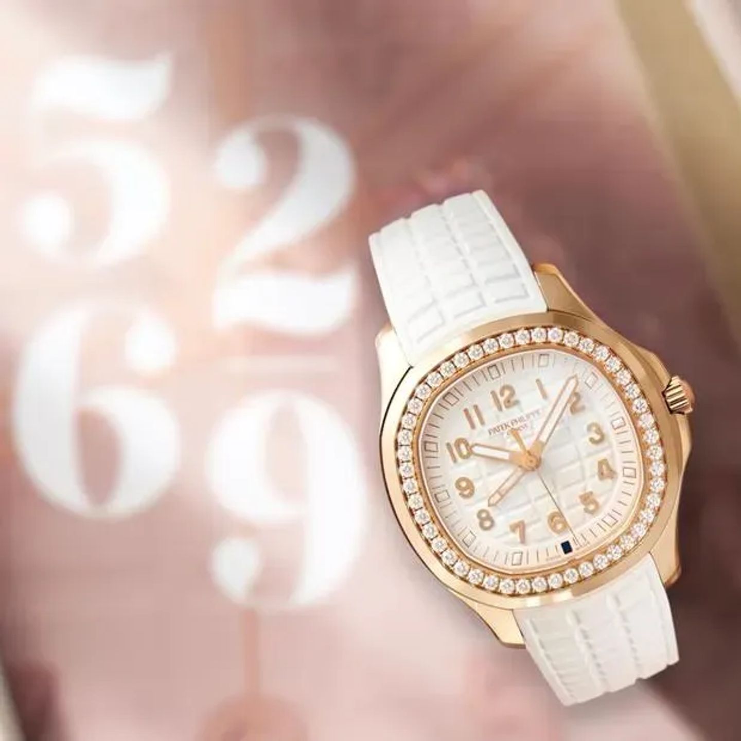 Patek Philippe Aquanaut 5269/200R-001 (2024) - Wit wijzerplaat 39mm Roségoud (4/6)