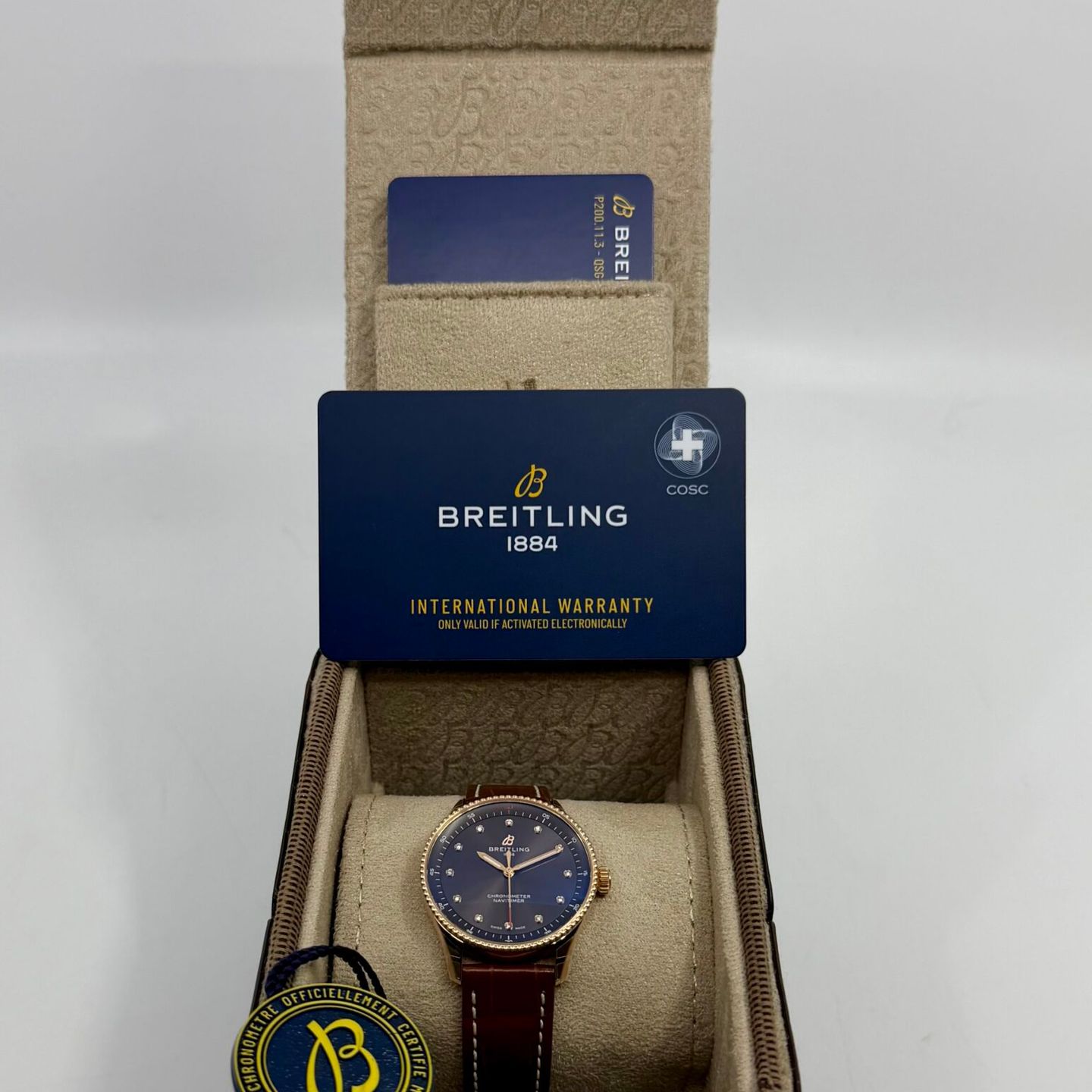 Breitling Navitimer R77320E31Q1P1 (2025) - Brown dial 32 mm Red Gold case (3/8)