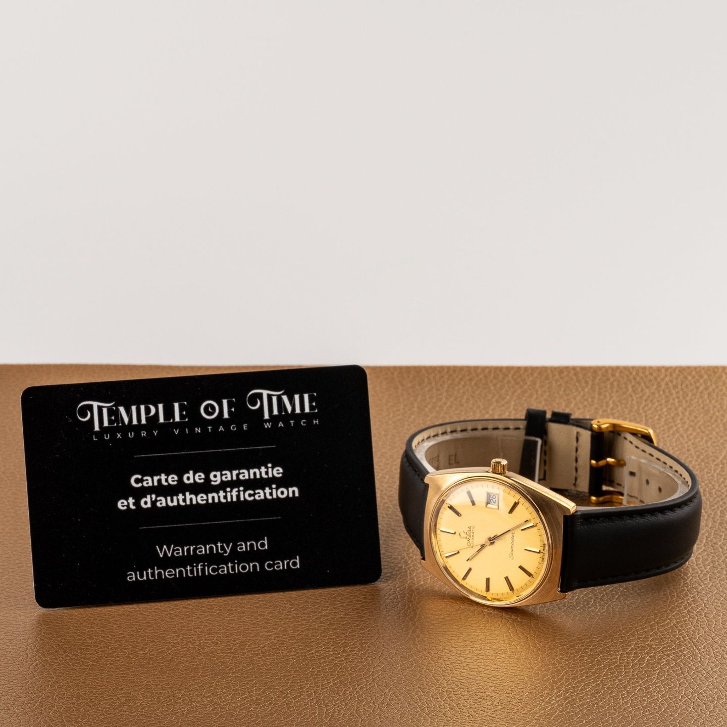 Omega Seamaster 166.0204 (1977) - Black dial 35 mm Gold/Steel case (6/8)