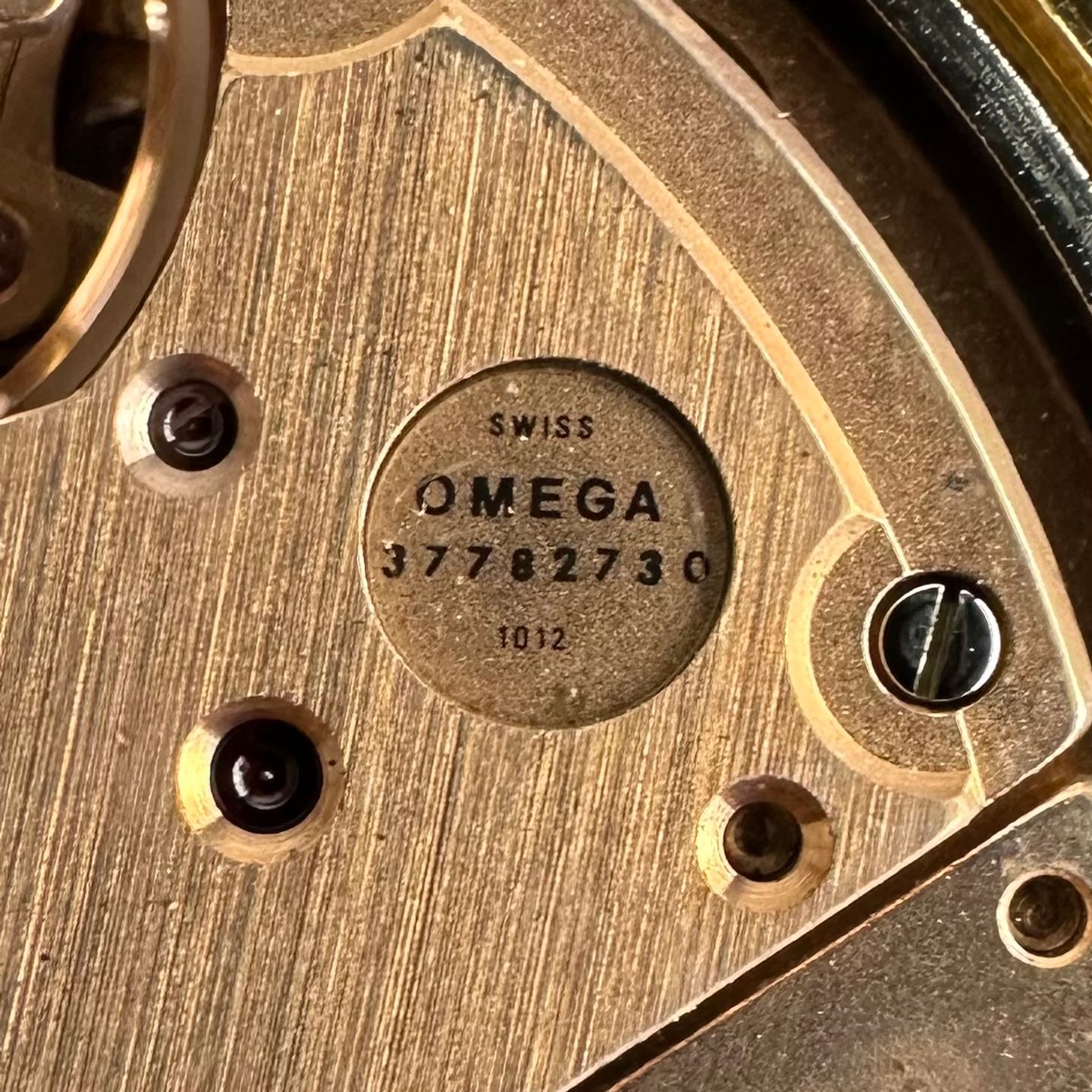 Omega Genève 166.0168 (1973) - Rood wijzerplaat 36mm Goud/Staal (4/8)