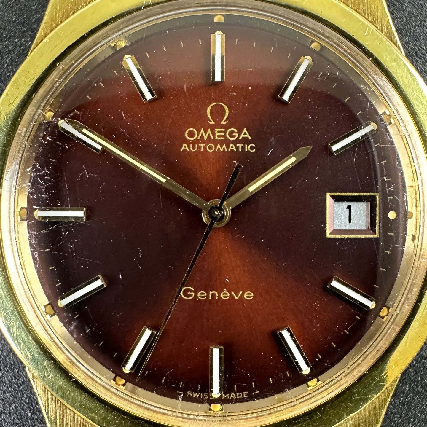 Omega Genève 166.0168 (1973) - Rood wijzerplaat 36mm Goud/Staal (8/8)