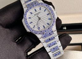 Patek Philippe Nautilus 7118/1451G-001 (2024) - White dial 35 mm White Gold case