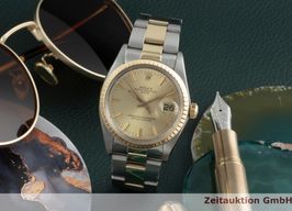 Rolex Oyster Perpetual Date 1505 (1977) - Champagne wijzerplaat 34mm Staal