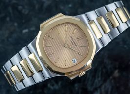 Patek Philippe Nautilus 3800/1JA (1991) - Champagne wijzerplaat 37mm Goud/Staal