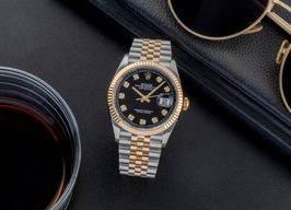 Rolex Datejust 36 126233 (Onbekend (willekeurig serienummer)) - Zwart wijzerplaat 36mm Goud/Staal