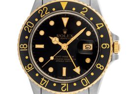 Rolex GMT-Master 16753 (1984) - Black dial 40 mm Gold/Steel case